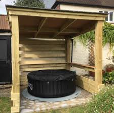 A gazebo which is all made of wood covers a big hot tub which is enough to provide you great comfort. Our Top Hot Tub Shelters Of 2017 To Inspire You Lay Z Spa Blog Lay Z Spa Uk