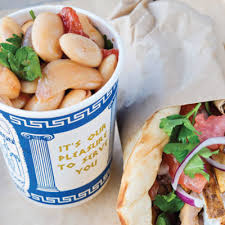 Copy space.shaurma, shaurma doner, meat with vegetables in a bread cake, on. Greek Eats Authentic Rotisserie