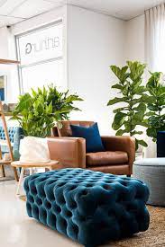 An Arthur G Velvet Diamond Button Ottoman And Leather Manhattan Armchair Melbourne Blue Chairs Living Room Leather Couches Living Room Arm Chairs Living Room