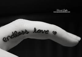 This butterfly tattoo has been beautifully designed with the words hope, faith, believe and love with a treble clef for the body. Forever Love Finger Tattoos Parryz Com