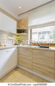 Standard features include under mount full extension soft close drawer glides and concealed european style hinges with soft close feature. White And Wood Kitchen With Cabinets White Wood Trendy Bright Kitchen Interior With Minimalist Cabinets Sink And Garden Canstock