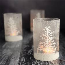 Place these by the side of your aisle or passageway, hang these by our holding brightly lit candles, these votive holders will ooze the oodles of elegance, vim, and ecstasy into your special celebration. Snow Scene Christmas Candle Holder Frosted Votive In Winter White 9 Gisela Graham 2018 Collection Via The Contemp Candle Holders Christmas Candle Candles