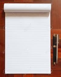 Each perco lite pricing kit includes a brand new one line pricing gun labeler, 5,000 blank white price labels, instruction manual, 2 inkers, and label scraper. Notebook Blank White Page And Pen Wooden Floor In The Background Stock Photo Picture And Royalty Free Image Image 47036847