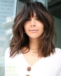 No other steps up the haircut for sleek hair like arched bangs! 40 Universal Shoulder Length Hair With Bangs Ideas