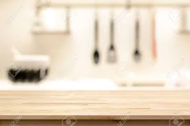Maybe you would like to learn more about one of these? Wood Table Top As Kitchen Island On Blur Kitchen Interior Background Stock Photo Picture And Royalty Free Image Image 44629875
