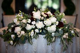 Long And Low Sweetheart Table Arrangement Sweetheart Table Flower Arrangements Sweetheart Table Flowers Table Flower Arrangements