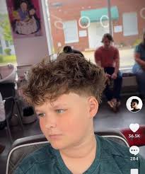 Who is the best barber in Greenville for a specific haircut?