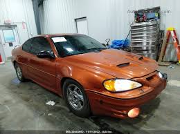 Image result for Sunburst Orange 2004 Pontiac