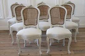 French gray and white chairs with brown glaze. Set Of Eight Vintage French Painted Cane Back Dining Chairs Leather Dining Room Chairs White Leather Dining Chairs Vintage Dining Chairs