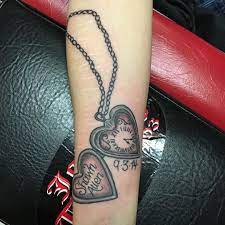 Pin By Tattoomaze On Tattoos Locket Tattoos Heart Locket Tattoo Tattoos