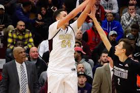 Tyrn Flowers signs with UMass; Derek Kellogg says 3-star recruit will be  'big part of our program'