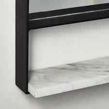 Tucked behind the profile of the mirror is a hidden shelf for easy to access storage. Mirror With Marble Shelf Cre8 Nyc