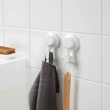 There also are some hooks, a wooden shelving unit and a vilto towel stand for all couple's bath towels. Tisken White Hook With Suction Cup Ikea