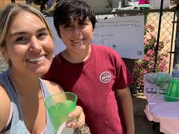 Young entrepreneur sells lemonade and cakes at Van Hoosen Farm