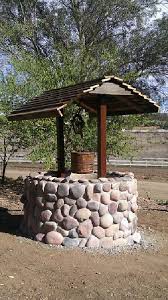 Wishing Well Wishing Well Garden Garden Decor Projects Garden Stones