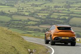 Image result for Satin Golden Saffron 2022 Aston Martin