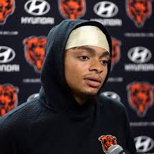 Justin Fields runs for 104 yards and passes for 169 in his return. Bears  lose to Lions 31-26