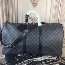 This duffle bag features two top rolled leather handles and has removable and adjustable canvas shoulder strap that allows the bag to. Louis Vuitton N41413 Keepall Bandouliere 55 Damier Graphite Canvas Vuitton Louis Vuitton Handbags Black Louis Vuitton Handbags