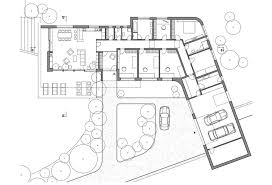Modern home design plans feature sleek angles and lines, ample lighting, and high ceilings. Shaped Modern House Design On Hillside With Unusual Layout L Shaped House Plans L Shaped House House Plans