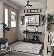 Take a look at the cool ideas below and get inspired! 31 Cozy And Inviting Farmhouse Entryway Decorating Ideas