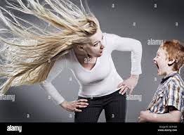 Mother Yelling At Son As Her Hair Blows Wildly Stock Photo - Alamy