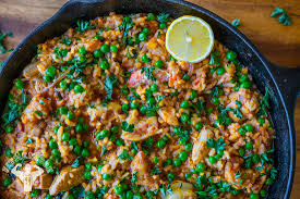 Stir in the garlic, spices and thyme, and cook for a further 2 minutes. Amazing One Skillet Healthy Paella Recipe Fit Men Cook