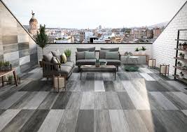 Grey Exteriors With Floor And Wall Tile From The Old Station Collection By Rocersa Ceramica Porcelain Tile Patio Concrete Patio