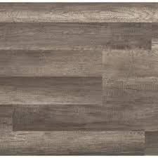 Grey hardwood floors vary in many different ways depending on the species of wood, the intensity of the stain, and the variation of the coloring. Gray Laminate Wood Flooring Laminate Flooring The Home Depot