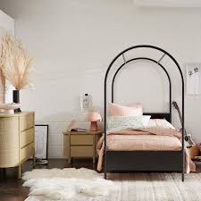 Shop our best selection of beds & bed frames to reflect your style and inspire your home. Canyon Arched Twin Black Canopy Bed With Upholstered Headboard Crate Kids
