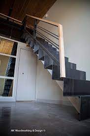 Steel Ribbon Stair With Maple Curved Stringer And Handrail Custom And Handmade Modern Stair Nkwoodworking Curved Staircase Steel Stairs Staircase Design
