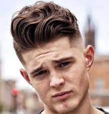 35 Best Slicked Back Hairstyles For Men 2021 Guide Wavy Hair Men Fade Haircut Slicked Back Hair