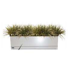 You can take a filing cabinet…remove the drawers (use them for another project) …paint it in the color that you love…drill holes for drainage…attach caster wheels and plant. Olp Planter Ninetwofive Interiors