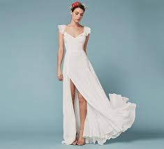 Exquisite crochet lace woven into a retro 70's style gown with fitted bodice, gorgeous flowing skirt with customizable train, stretch satin lining and elastic adjustable. Beach Style Wedding Gowns Where To Buy Beautiful Bridal Dresses For Your Beachside Nuptials Honeycombers Singapore