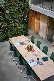Minimal Scandinavian Meeting Room With Concrete Floors And Green Plants Flokk Meeting Room Design Conference Room Design Meeting Room Design Creative