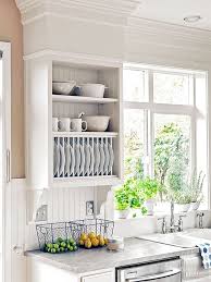 31 Creative Ways To Store Dishes And Utensils That Go Beyond Cabinetry Kitchen Window Shelves Diy Kitchen Cabinets Rustic Kitchen Decor