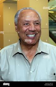 Former St. Louis Hawks point guard and head basketball coach of the Atlanta  Hawks Lenny Wilkens (R) says hello to friend Jack Levitt during a reunion  of od Hawks team members in