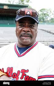 Member of the National Baseball Hall of Fame Eddie Murray, talks with  reporters after participation in "Play Ball," during Induction week in  Cooperstown, New York