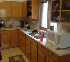 This empty nester from west roxbury ma had a dated kitchen, with built in place cabinets, in desperate need of a remodel. Small Kitchen Remodel Before And After Amanda Katherine