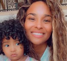 CIARA CUDDLES UP TO CAPRI BRYANT IN ADORABLE PHOTO