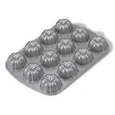 Now readinghow to make disney's mini gingerbread bundt cakes, because we're secretly in holiday mode. Nordic Ware Mini 12 Count Brownie Bundt Pan Sur La Table