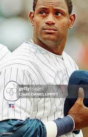 Chicago Cub rightfielder Sammy Sosa wears a patch in memory of the... News  Photo