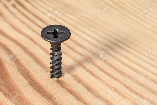 Black Screw Screwed Into Wood Stock Photo, Picture and Royalty Free Image.  Image 89554240.