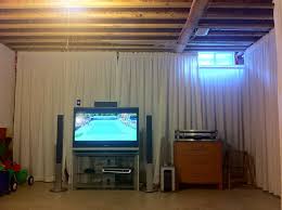 6 creative ways to elevate your unfinished basement angi angie s. Top 60 Best Basement Ceiling Ideas Downstairs Finishing Designs Imagesofbasementceil Unfinished Basement Walls Unfinished Basement Bedroom Basement Bedrooms