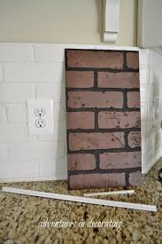This painted faux brick backsplash is not only easy to install, it's budget friendly too. More Changes In Our Kitchen Faux Brick Backsplash Faux Brick Brick Backsplash Kitchen