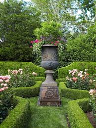 English Garden In The Hamptons Beautiful Gardens Formal Garden Design Garden Urns