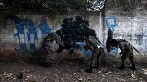 They exert control over territory and extort and gather intelligence on residents and those passing through. Erasing Gang Graffiti In El Salvador