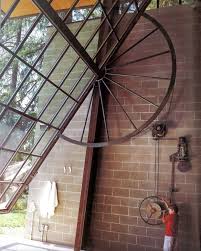 Tom Kundig Putting The Fun Back Into Opening A Garage Door Zeyna Sanjania Glass Garage Door Garage Doors Garage Door Makeover