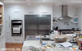 Kitchen cabinet refacing is an inexpensive way to freshen up your kitchen without paying for a full remodel. Lift Up Cabinet Doors Sawdust Girl