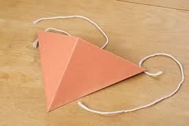 Crease a square piece of paper diagonally from each corner. How To Make A Construction Paper Beak Construction Crafts Bird Beak Mask Diy Bird Beak Mask