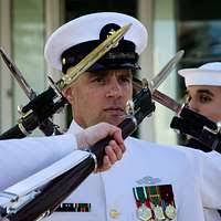Senior Chief Hospital Corpsman Nathan Gibbs and the U.S. Navy Ceremonial  Guard Drill Team preform during the opening ceremony for Phoenix Navy Week  at the Arizona Science Center.